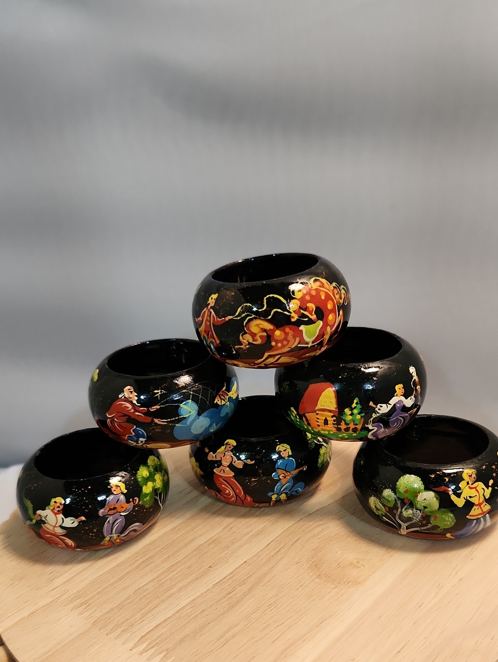 Vintage Russian Hand-Painted Black Lacquer Napkin Rings with Folk Art Scenes
